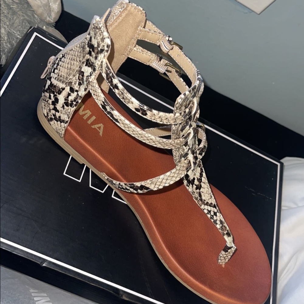 snake skin sandals, never worn, package still in them